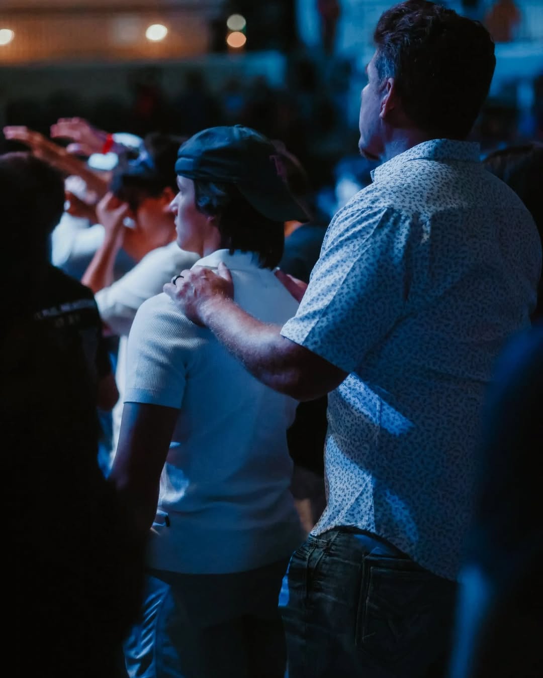 Couple worshipping together